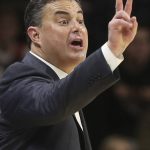 Arizona basketball coach Sean Miller calls to his team during the first half of an NCAA college basketball game against Oregon State in Corvallis, Ore., Sunday, Jan. 12, 2020. (AP Photo/Chris Pietsch)