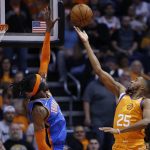 Phoenix Suns forward Mikal Bridges (25) releases a shot next to Oklahoma City Thunder center Nerlens Noel during the first half of an NBA basketball game Friday, Jan. 31, 2020, in Phoenix. (AP Photo/Ross D. Franklin)