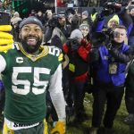 Green Bay Packers' Za'Darius Smith smiles as he takes a selfie after an NFL divisional playoff football game against the Seattle Seahawks Sunday, Jan. 12, 2020, in Green Bay, Wis. The Packers won 28-23 to advance to the NFC Championship. (AP Photo/Mike Roemer)