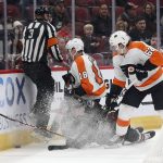 Arizona Coyotes' Jakob Chychrun (6) goes down as he gets sandwiched between Philadelphia Flyers' Tyler Pitlick (18) and Nicolas Aube-Kubel (62) during the first period of an NHL hockey game Saturday, Jan. 4, 2020, in Glendale, Ariz. (AP Photo/Darryl Webb)