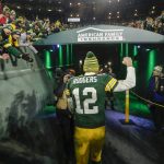 Green Bay Packers' Aaron Rodgers celebrates as he walks off the field after an NFL divisional playoff football game against the Seattle Seahawks Sunday, Jan. 12, 2020, in Green Bay, Wis. The Packers won 28-23 to advance to the NFC Championship. (AP Photo/Mike Roemer)