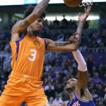 Phoenix Suns forward Kelly Oubre Jr. is fouled by New York Knicks guard Elfrid Payton (6) during the second half of an NBA basketball game Friday, Jan. 3, 2020, in Phoenix. The Suns won 120-112. (AP Photo/Rick Scuteri)