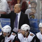 Arizona Coyotes coach Rick Tocchet calls out to players during the third period of the team's NHL hockey game against the Florida Panthers, Tuesday, Jan. 7, 2020 in Sunrise, Fla. The Coyotes won 5-2. (AP Photo/Wilfredo Lee)