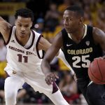 Colorado guard McKinley Wright IV (25) drives past Arizona State guard Alonzo Verge (11) during the first half of an NCAA college basketball game, Thursday, Jan. 16, 2020, in Tempe, Ariz. (AP Photo/Matt York)