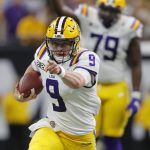 LSU quarterback Joe Burrow runs against Clemson during the first half of a NCAA College Football Playoff national championship game Monday, Jan. 13, 2020, in New Orleans. (AP Photo/Gerald Herbert)