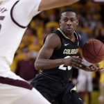 Colorado guard McKinley Wright IV looks to pass against Arizona State during the first half of an NCAA college basketball game, Thursday, Jan. 16, 2020, in Tempe, Ariz. (AP Photo/Matt York)