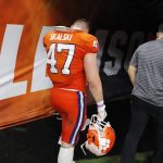 Clemson linebacker James Skalski leaves the game during the second half of a NCAA College Football Playoff national championship game against LSU, Monday, Jan. 13, 2020, in New Orleans. (AP Photo/Gerald Herbert)