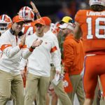 Clemson head coach Dabo Swinney celebrates after scoring during the second half of a NCAA College Football Playoff national championship game against LSU, Monday, Jan. 13, 2020, in New Orleans. (AP Photo/David J. Phillip)