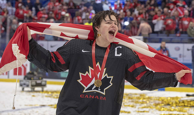 Canada's captain Barrett Hayton celebrates after defeating Russia n the gold medal game at the Worl...