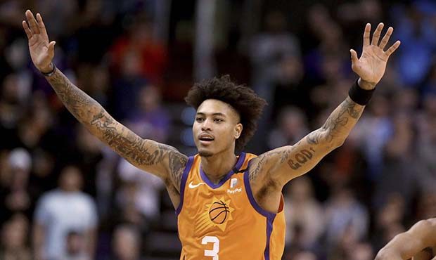 Phoenix Suns' Kelly Oubre Jr. celebrates late in the team's NBA basketball game against Orlando Mag...