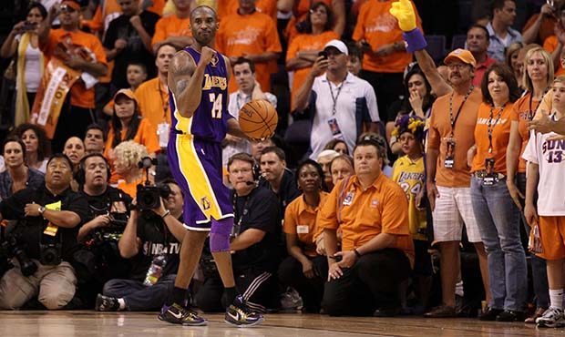 Kobe Bryant #24 of the Los Angeles Lakers reacts after a play in the fourth quarter of Game Six of ...