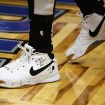 Los Angeles Clippers forward Montrezl Harrell (5) wears shoes during warmups, paying tribute to Kobe Bryant before an NBA basketball game against the Orlando Magic in Orlando, Fla., Sunday, Jan. 26, 2020. (AP Photo/Reinhold Matay)