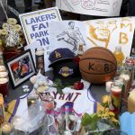 A memorial near Staples Center after the death of Laker legend Kobe Bryant Sunday, Jan. 26, 2020, in Los Angeles. (AP Photo/Michael Owen Baker)