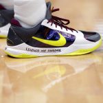 New Orleans Pelicans guard Josh Hart bears a memorial message on his shoes for former NBA great Kobe Bryant, who died today in a helicopter crash, in the first half of an NBA basketball game against the Boston Celtics in New Orleans, Sunday, Jan. 26, 2020. (AP Photo/Gerald Herbert)