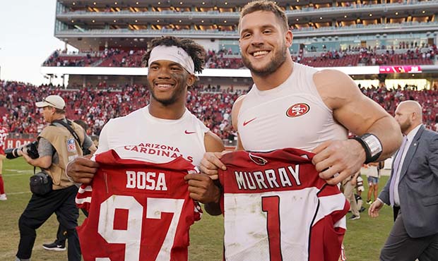 Kyler Murray #1 of the Arizona Cardinals and Nick Bosa #97 of the San Francisco 49ers exchange jers...