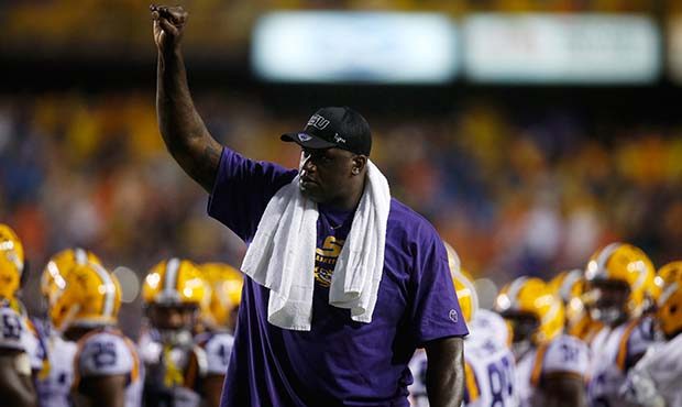 Former LSU Tiger Shaquille O'Neal waves to the crowd as he is introduced on the field during the ga...