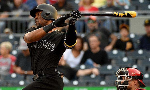 Starling Marte #6 of the Pittsburgh Pirates hits a single to center field in the first inning durin...