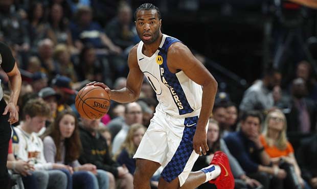 Indiana Pacers forward T.J. Warren drives down the court with the ball in the first half of an NBA ...
