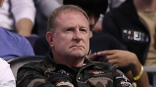 Phoenix Suns owner Robert Sarver sits during the first half of the NBA game against the Golden Stat...