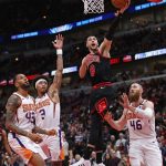 CHICAGO, ILLINOIS - FEBRUARY 22: Zach LaVine #8 of the Chicago Bulls puts up a shot between (L-R) Jonah Bolden #43, Kelly Oubre Jr. #3 and Aron Baynes #46 of the Phoenix Suns at the United Center on February 22, 2020 in Chicago, Illinois. NOTE TO USER: User expressly acknowledges and agrees that, by downloading and or using this photograph, User is consenting to the terms and conditions of the Getty Images License Agreement. (Photo by Jonathan Daniel/Getty Images)