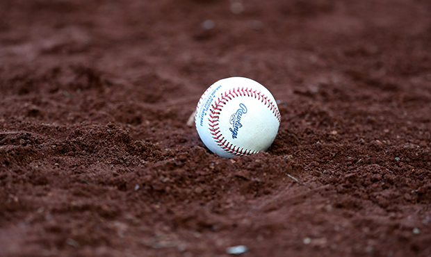 A baseball sits in the dirt following the Washington Nationals and San Diego Padres game at Nationa...