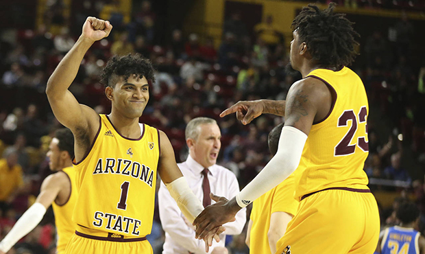 Arizona State's Remy Martin (1) and Romello White (23) celebrate during the first half of the team'...