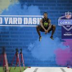Memphis running back Patrick Taylor prepares to run the 40-yard dash at the NFL football scouting combine in Indianapolis, Friday, Feb. 28, 2020. (AP Photo/Michael Conroy)