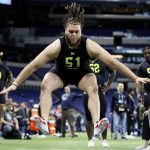 Alabama offensive lineman Jedrick Wills runs a drill at the NFL football scouting combine in Indianapolis, Friday, Feb. 28, 2020. (AP Photo/Charlie Neibergall)