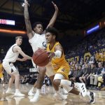 Arizona State guard Remy Martin, foreground, dribbles around California guard Paris Austin during the second half of an NCAA college basketball game in Berkeley, Calif., Sunday, Feb. 16, 2020. (AP Photo/Jeff Chiu)