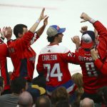 Washington Capitals fans cheer on their team during the first period of an NHL hockey game against the Arizona Coyotes Saturday, Feb. 15, 2020, in Glendale, Ariz. (AP Photo/Ross D. Franklin)