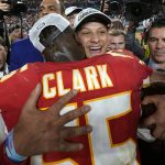 Kansas City Chiefs quarterback Patrick Mahomes, rear, celebrates with Frank Clark after defeating the San Francisco 49ers in the NFL Super Bowl 54 football game Sunday, Feb. 2, 2020, in Miami Gardens, Fla. (AP Photo/David J. Phillip)