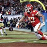 Kansas City Chiefs' Travis Kelce (87) scores against the San Francisco 49ers during the second half of the NFL Super Bowl 54 football game Sunday, Feb. 2, 2020, in Miami Gardens, Fla. (AP Photo/Mark Humphrey)