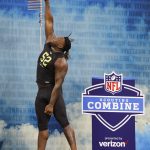 Georgia offensive lineman Isaiah Wilson runs a drill at the NFL football scouting combine in Indianapolis, Friday, Feb. 28, 2020. (AP Photo/Charlie Neibergall)