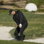Jason Day, of Australia, hits the ball out of a bunker onto the second green of the Pebble Beach Golf Links during the final round of the AT&T Pebble Beach National Pro-Am golf tournament Sunday, Feb. 9, 2020, in Pebble Beach, Calif. (AP Photo/Eric Risberg)