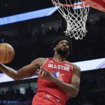 Joel Embiid of the Philadelphia 76ers dunks during the second half of the NBA All-Star basketball game Sunday, Feb. 16, 2020, in Chicago. (AP Photo/Nam Huh)