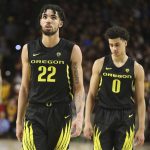 Down by five points Oregon's Addison Patterson (22) and Will Richardson (0) react late in an NCAA college game against Arizona State, Thursday, Feb. 20, 2020, in Tempe, Ariz. (AP Photo/Darryl Webb)
