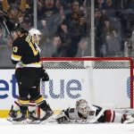 Boston Bruins' Charlie Coyle celebrates his goal on Arizona Coyotes goaltender Adin Hill during the second period of an NHL hockey game Saturday, Feb. 8, 2020, in Boston. (AP Photo/Winslow Townson)