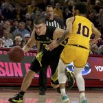 Oregon's Payton Pritchard (3) drives to the basket against Arizona State's Jaelen House (10) during the first half of an NCAA college basketball game Thursday, Feb. 20, 2020, in Tempe, Ariz. (AP Photo/Darryl Webb)