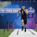 Purdue tight end Brycen Hopkins runs the 40-yard dash at the NFL football scouting combine in Indianapolis, Thursday, Feb. 27, 2020. (AP Photo/Michael Conroy)
