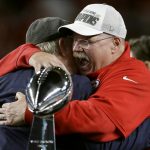 Kansas City Chiefs head coach Andy Reid receives congratulations from broadcaster Terry Bradshaw after defeating the San Francisco 49ers in the NFL Super Bowl 54 football game Sunday, Feb. 2, 2020, in Miami Gardens, Fla. (AP Photo/Chris O'Meara)
