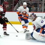 New York Islanders goaltender Semyon Varlamov (40) makes the save on Arizona Coyotes right wing Clayton Keller (9) in the second period during an NHL hockey game, Monday, Feb. 17, 2020, in Glendale, Ariz. (AP Photo/Rick Scuteri)