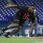 Texas A&M defensive lineman Justin Madubuike runs a drill at the NFL football scouting combine in Indianapolis, Saturday, Feb. 29, 2020. (AP Photo/Michael Conroy)