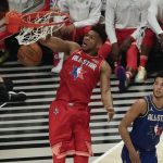 Giannis Antetokounmpo of the Milwaukee Bucks dunks during the first half of the NBA All-Star basketball game Sunday, Feb. 16, 2020, in Chicago. (AP Photo/David Banks)