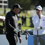 
              Phil Mickelson, left, and Nick Taylor, of Canada, talk while waiting to hit from the third tee of the Pebble Beach Golf Links during the final round of the AT&T Pebble Beach National Pro-Am golf tournament Sunday, Feb. 9, 2020, in Pebble Beach, Calif. (AP Photo/Eric Risberg)
            
