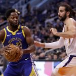 Golden State Warriors guard Jeremy Pargo (20) looks to pass as Phoenix Suns guard Ricky Rubio defends during the first half of an NBA basketball game, Wednesday, Feb. 12, 2020, in Phoenix. (AP Photo/Matt York)