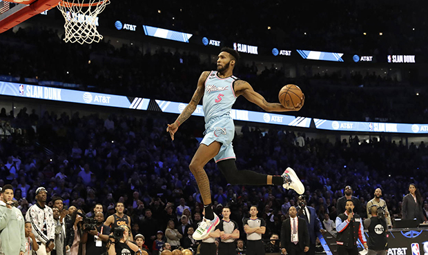 Miami Heat's Derrick Jones Jr. heads to the basket during the NBA All-Star slam dunk contest in Chi...