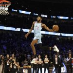 Miami Heat's Derrick Jones Jr. heads to the basket during the NBA All-Star slam dunk contest in Chicago, Saturday, Feb. 15, 2020. (AP Photo/Nam Y. Huh)