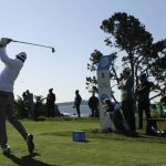 Nick Taylor, of Canada, hits from the fifth tee of the Pebble Beach Golf Links during the final round of the AT&T Pebble Beach National Pro-Am golf tournament Sunday, Feb. 9, 2020, in Pebble Beach, Calif. (AP Photo/Eric Risberg)