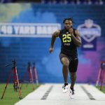 Georgia running back D'Andre Swift runs the 40-yard dash at the NFL football scouting combine in Indianapolis, Friday, Feb. 28, 2020. (AP Photo/Michael Conroy)