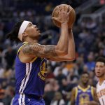 Golden State Warriors guard Damion Lee drives to the basket against the Phoenix Suns during the first half of an NBA basketball game, Wednesday, Feb. 12, 2020, in Phoenix. (AP Photo/Matt York)